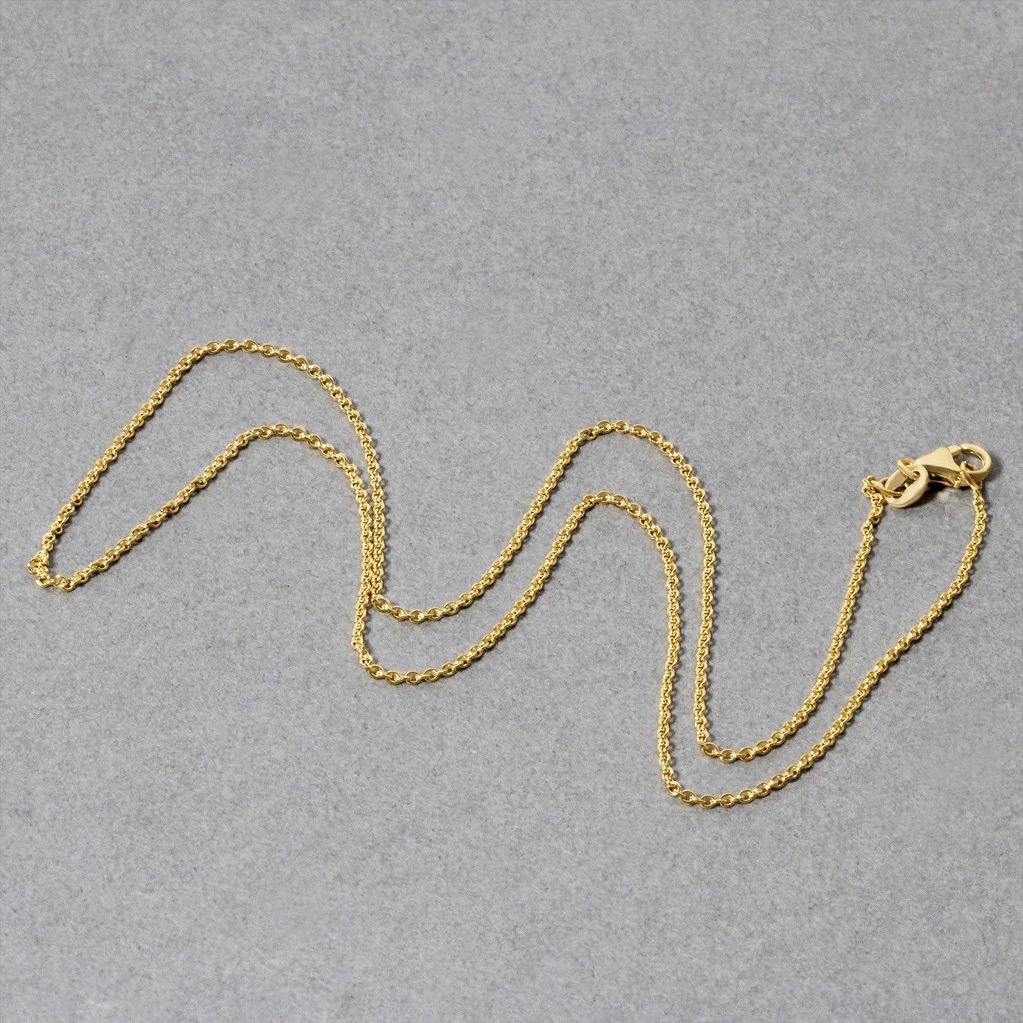 Cadena de eslabones redondos de cable de oro amarillo de 14k - 1.2mm