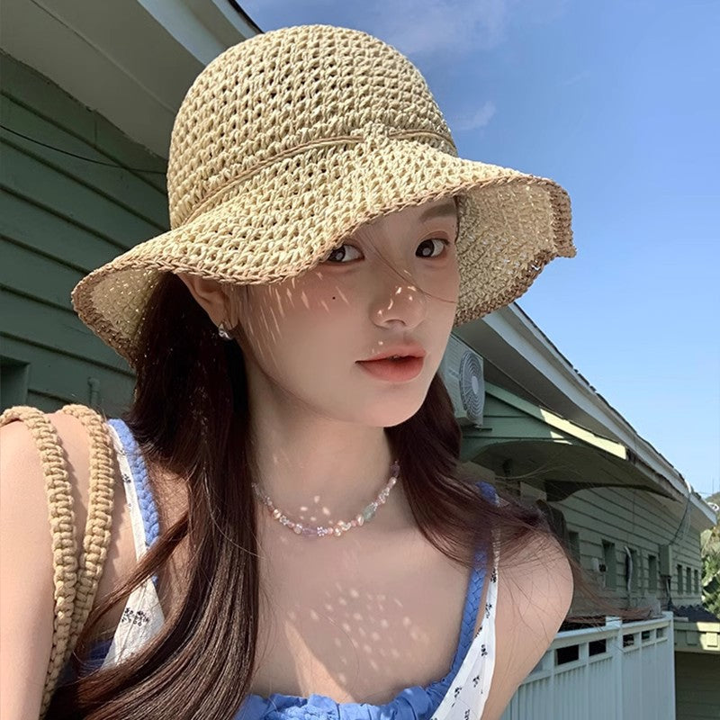 Chapeau en paille à large bord et résistant au soleil pour les sorties à la plage