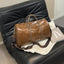Elegante bolsa de viaje de duffel con textura de PU en colores sólidos