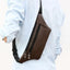 Elegant Black Men's Leather Waist Bag with Adjustable Strap