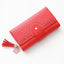 Geometric Letter Buckle Clutch Bag with Tassel Design