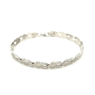 Bracelet en or blanc 14k en forme de cœur texturé