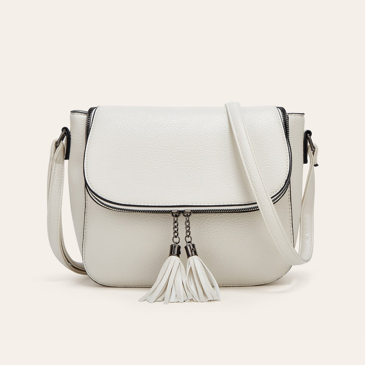 Fashionable Flip-Top Saddle Bag with Tassels