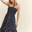 Robe tube florale smockée avec poches pour l'été