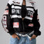 Veste à zip avec lettres et épaules tombantes