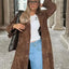 Manteau long élégant avec ceinture et design double boutonnage