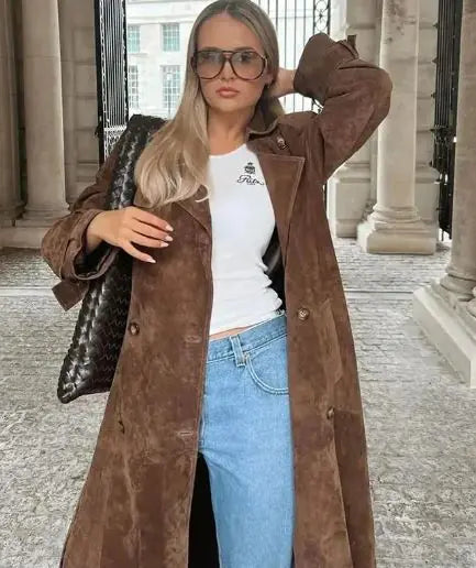Manteau long élégant avec ceinture et design double boutonnage