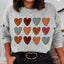 Sudadera con corazones de otoño