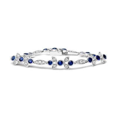Pulsera de eslabones florales de diamante y zafiro azul en oro blanco de 18 quilates - Tamaño 7"