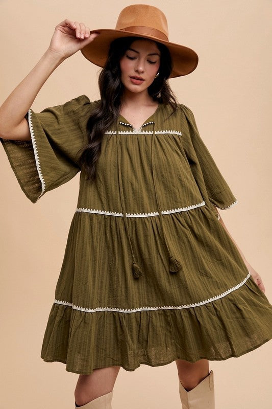 Chic Bohemian Tiered Dress with Tassel Details and Contrast Trim - Korvel