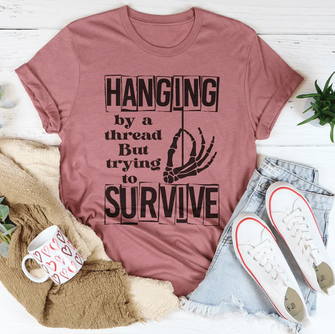 T-shirt Suspendu Par Un Fil