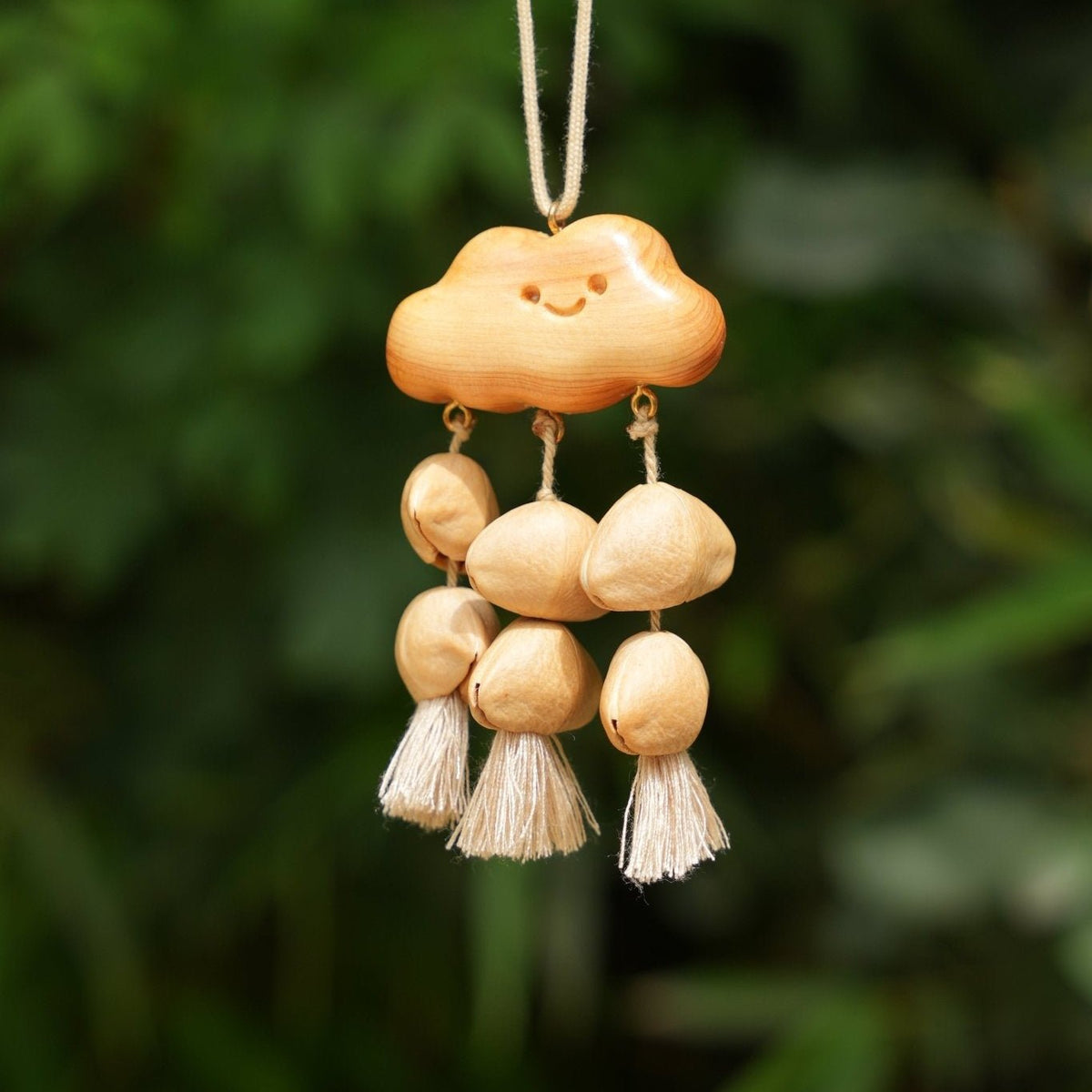La Nube Feliz - Móvil de Madera Hecho a Mano con Sonrisa y Semillas Naturales