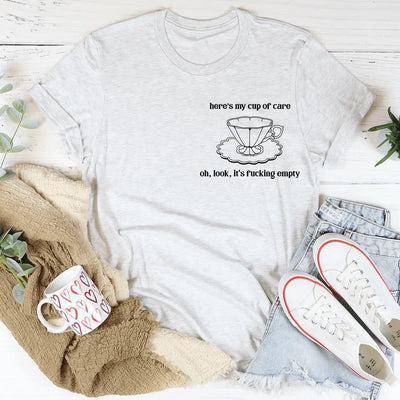 Aquí está mi camiseta "Taza de Cuidado"