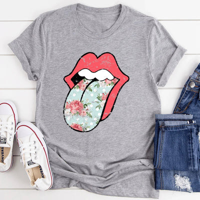 Camiseta hippie con estampado floral y lengua