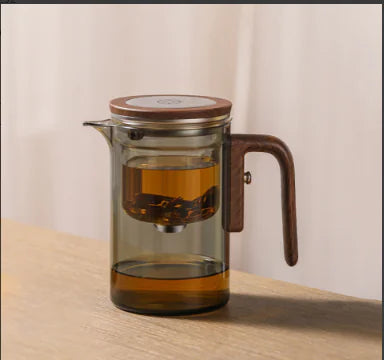 Elegante tetera de vidrio y juego de té con separación de agua