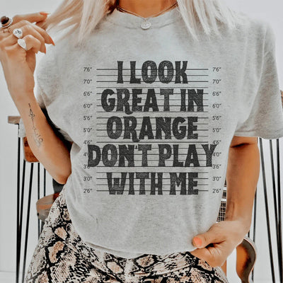 Me veo genial con la camiseta naranja "No juegues conmigo"