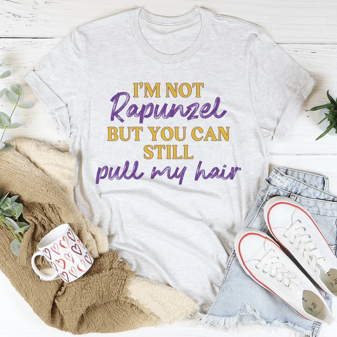 No soy Rapunzel pero aún puedes tirarme del pelo