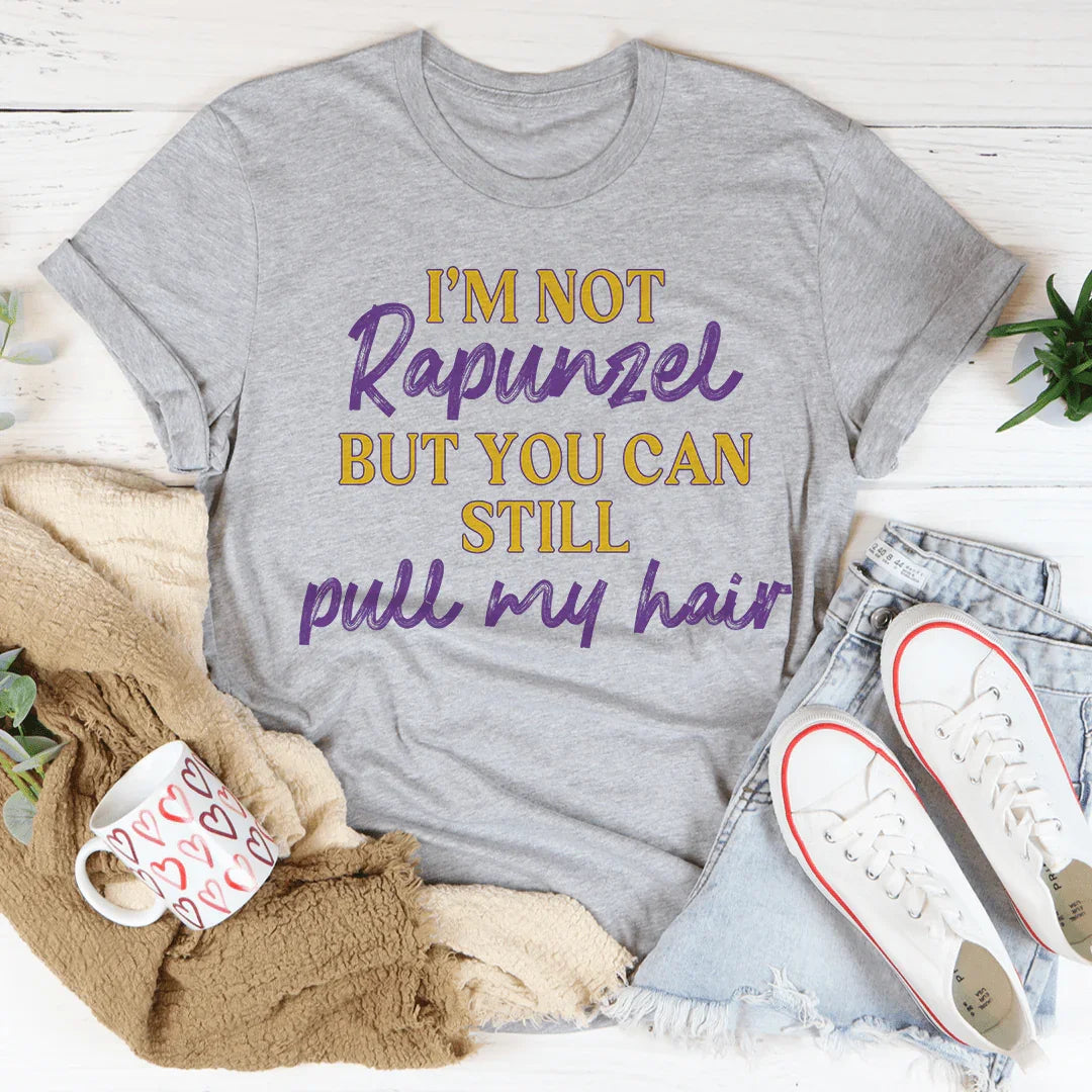 No soy Rapunzel pero aún puedes tirarme del pelo