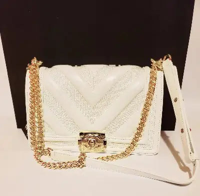 Sac à rabat matelassé en chevron de luxe