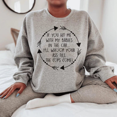 Sudadera "Si me golpeas con mis bebés en el auto"