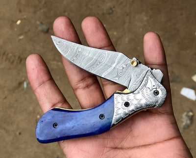 Artisan Crafted Damascus Steel Folding Pocket Knife with Vibrant Bone Handle & Leather Sheath - Korvel