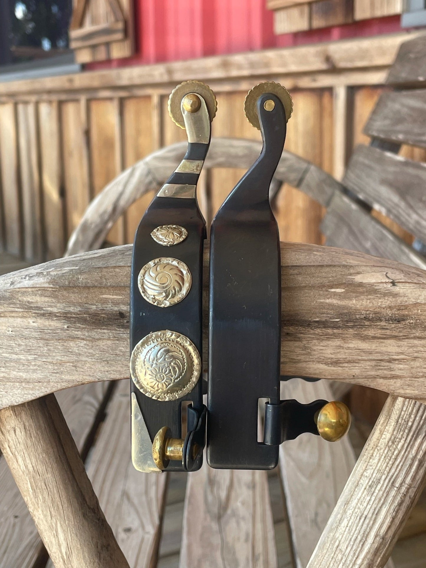 Elegant Black Steel Spurs with Silver Concho Accents - Korvel