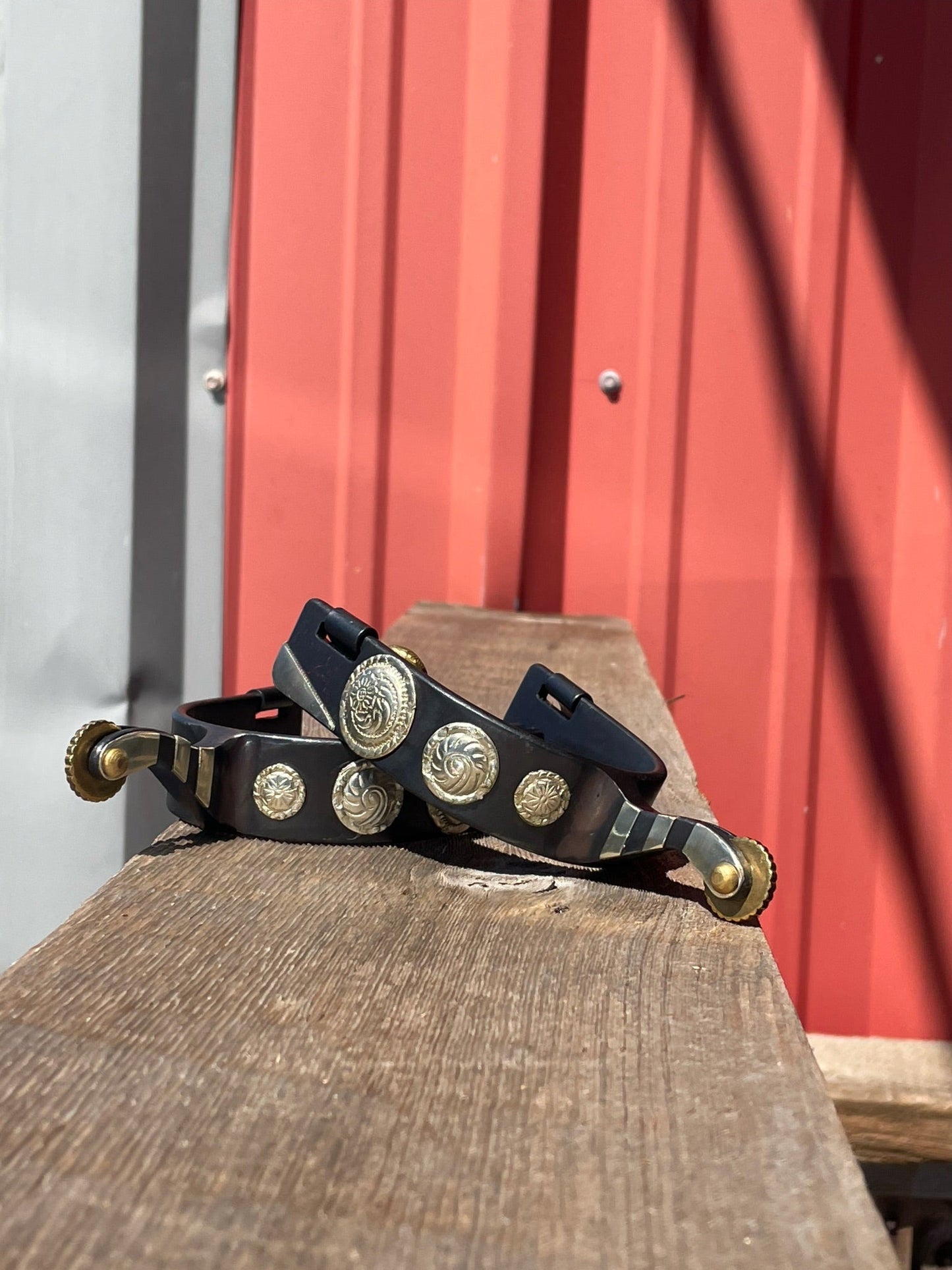 Elegant Black Steel Spurs with Silver Concho Accents - Korvel
