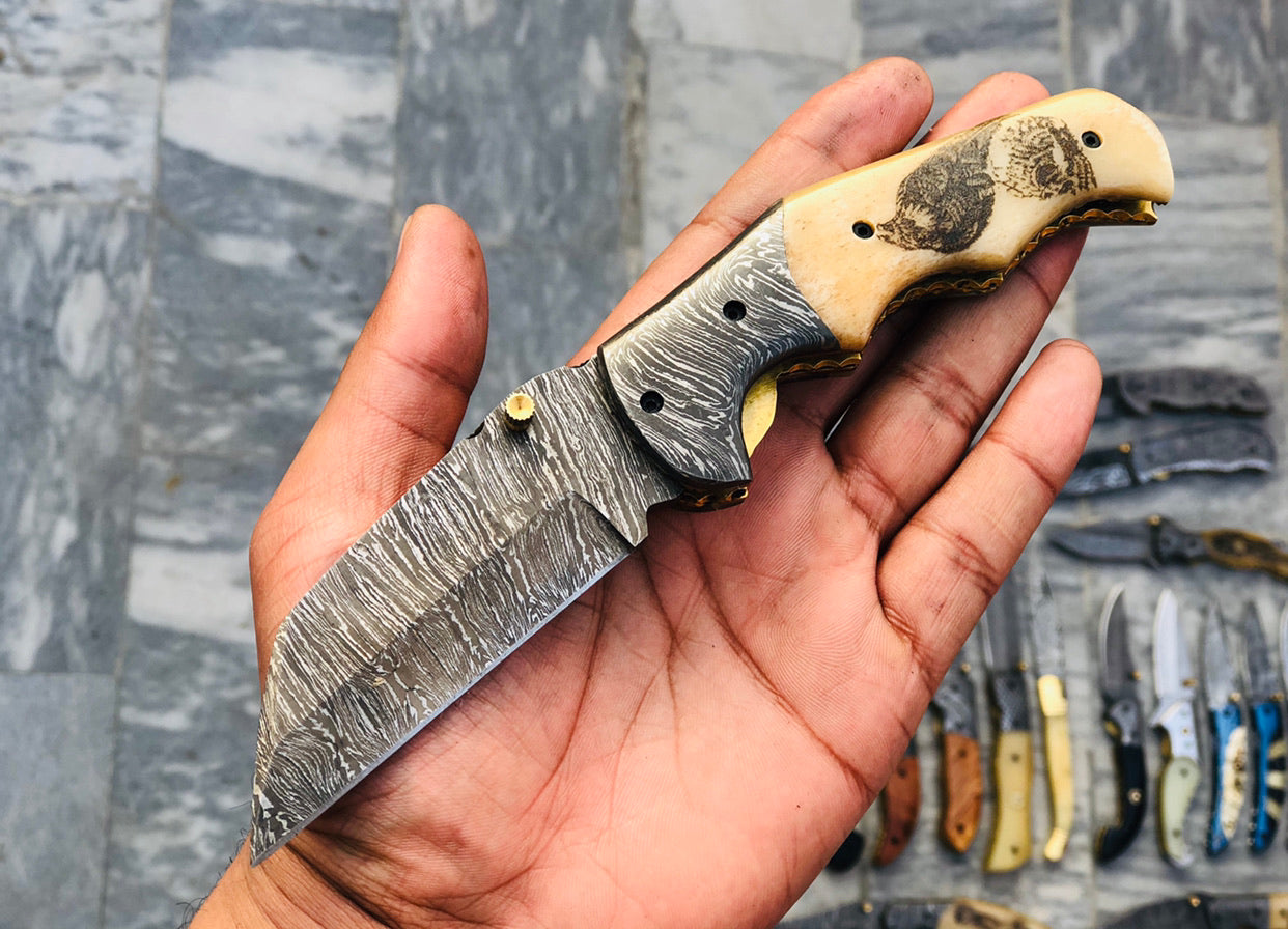 Artisan Crafted Damascus Steel Folding Pocket Knife with Unique Hand-Engraved Bone Handle & Leather Sheath by KBS Knives Store - Korvel
