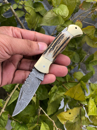 Artisan Crafted Damascus Steel Folding Pocket Knife with Antler Horn Handle and Leather Sheath - Exclusive from KBS Knives - Korvel