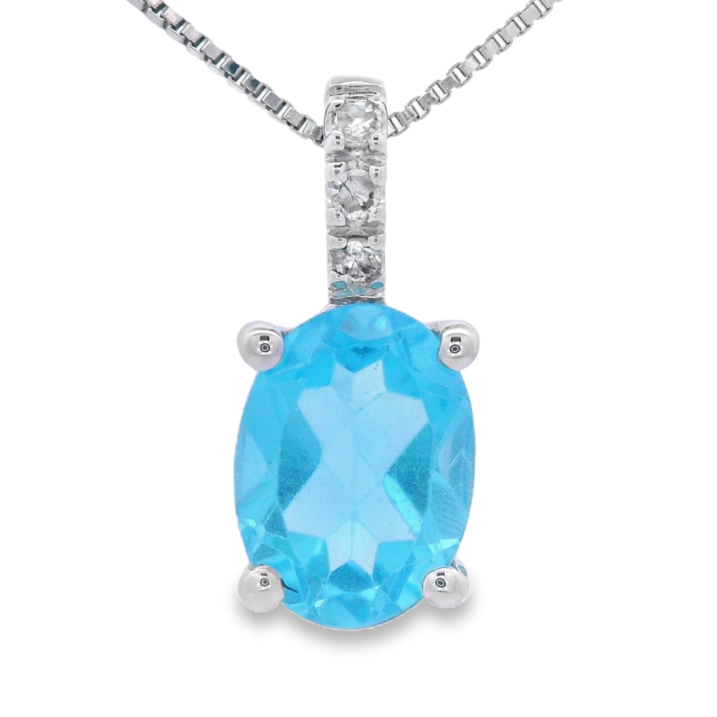 Pendentif en Topaze Bleue et Diamant en Or Blanc 10KT