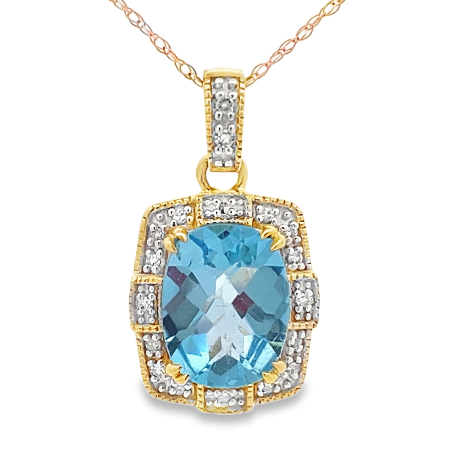 Pendentif en topaze bleue et diamant en or jaune 10KT