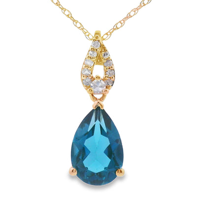 Pendentif en topaze bleue de Londres en or jaune 10KT