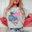 Embrace the Madness Tee: A Quirky Statement for Everyday Life - Korvel