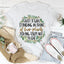Camiseta "Solo una chica parada frente a sus plantas"