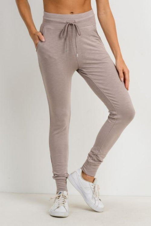 Joggers ajustados de cintura alta con puños