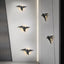 Applique murale en fer nordique en forme d'oiseau pour une décoration intérieure élégante