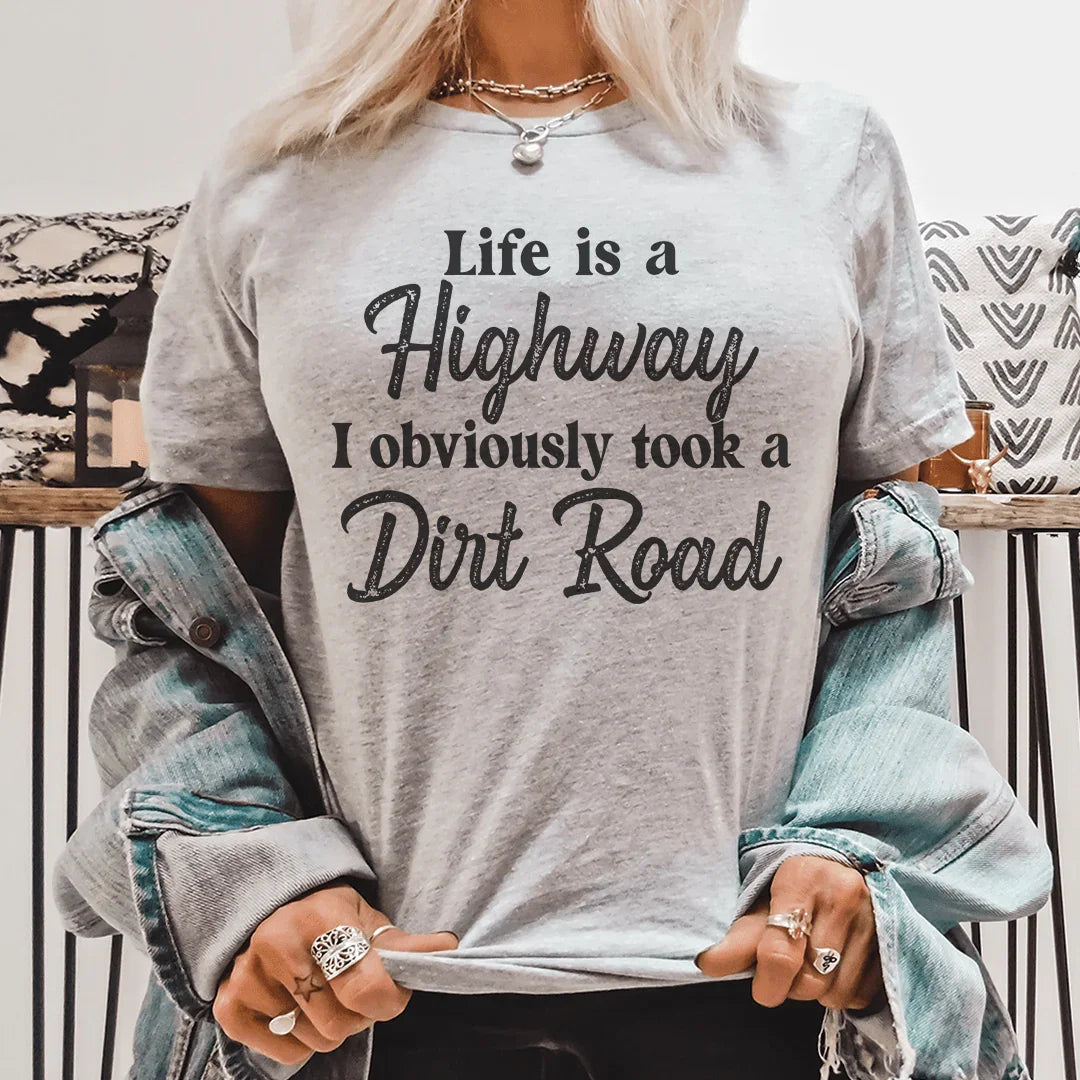 La vie est une autoroute Tee chemin de terre