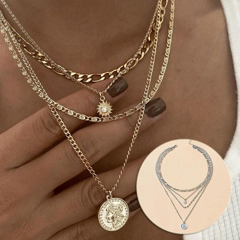 Mandotos Chunky Gold Layered Necklace with Coin Pendant and Sun Charm