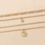 Mandotos Chunky Gold Layered Necklace with Coin Pendant and Sun Charm
