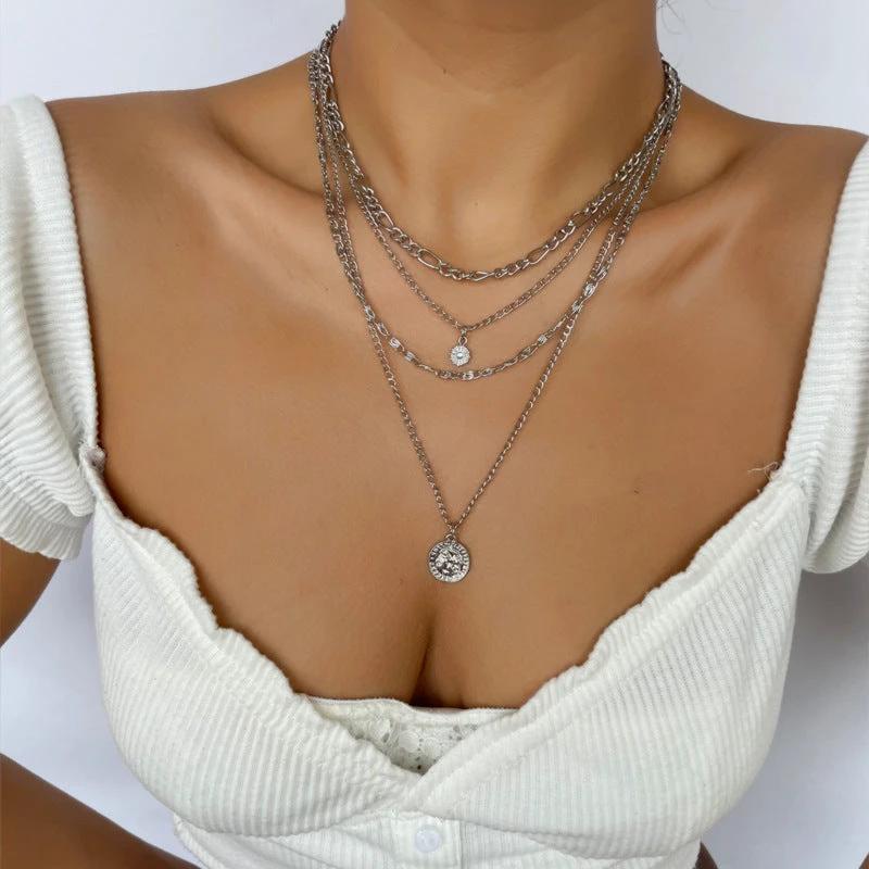 Mandotos Chunky Gold Layered Necklace with Coin Pendant and Sun Charm