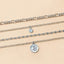 Mandotos Chunky Gold Layered Necklace with Coin Pendant and Sun Charm