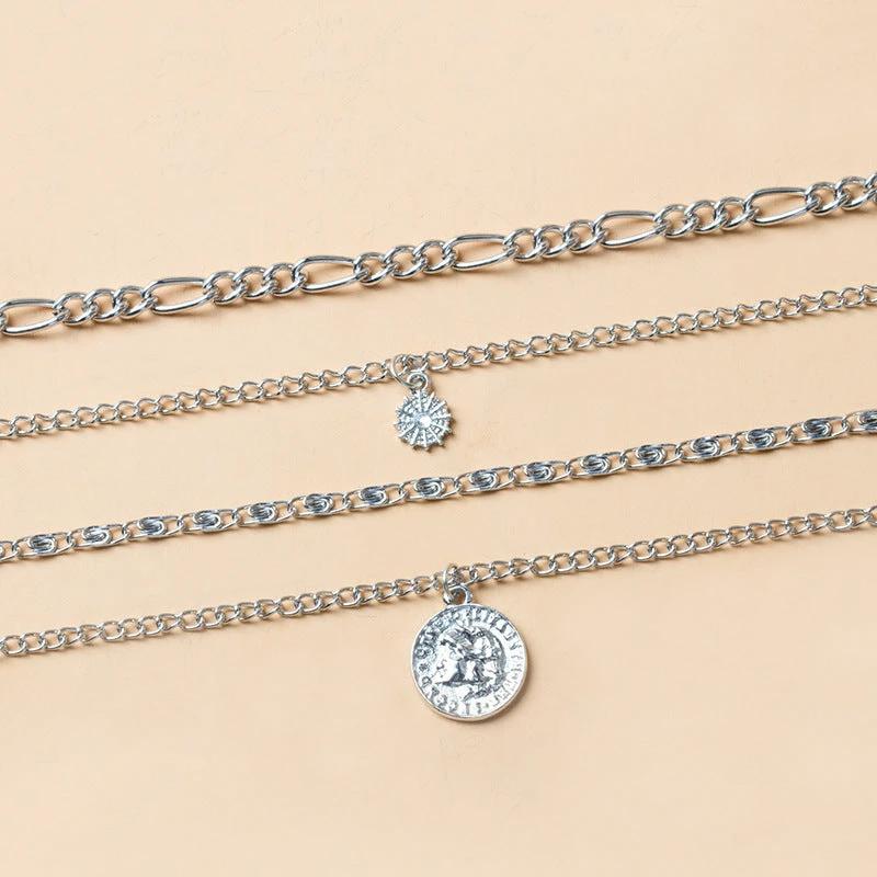 Mandotos Chunky Gold Layered Necklace with Coin Pendant and Sun Charm