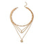 Mandotos Chunky Gold Layered Necklace with Coin Pendant and Sun Charm
