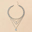 Mandotos Chunky Gold Layered Necklace with Coin Pendant and Sun Charm