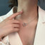 Collar de Corazón Hueco de Acero Inoxidable con Torcido