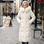 Manteau d'hiver long élégant avec col en fourrure épaisse