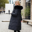 Manteau d'hiver long élégant avec col en fourrure épaisse