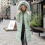 Manteau d'hiver long élégant avec col en fourrure épaisse