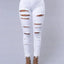 Jeans en denim déchirés skinny taille haute pour femmes