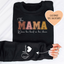 Ce Sweatshirt Personnalisé « Cette Maman Porte Son Coeur Sur Sa Manche »